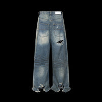DISTRESSED JEANS